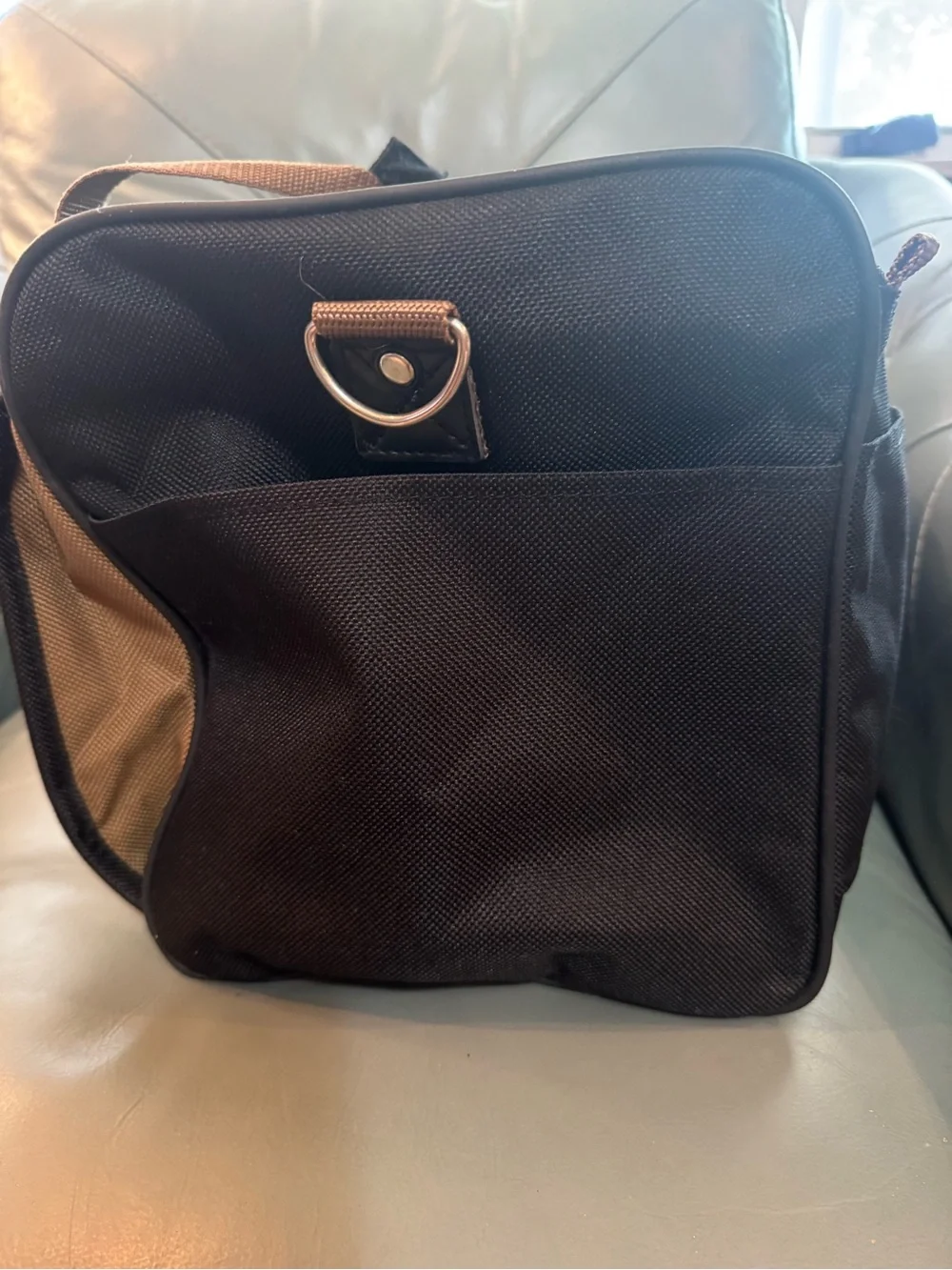 Chaps Black Duffel Bag with Tan Trim shoulder strap and double handle